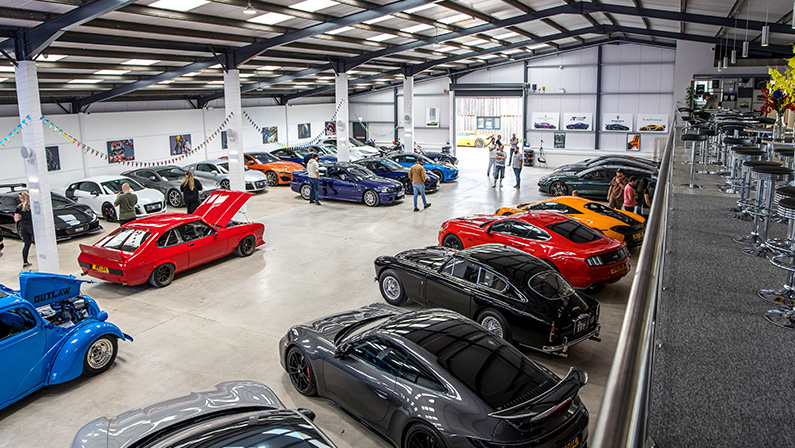 Bradford-on-Avon, UK- August 28, 2023: Supercars Storage Unit full of exotic spots and supercars.